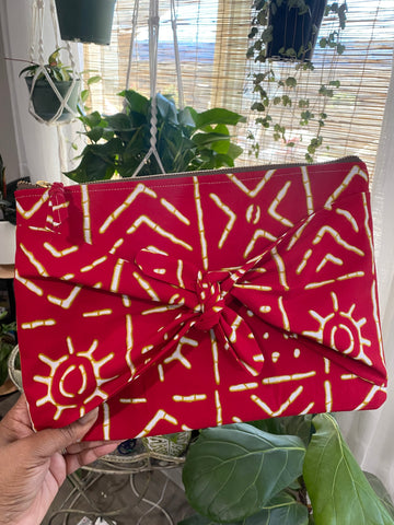 *Okoye* Camellia Clutch